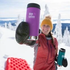 Klean Kanteen Insulated TK Wide With Café Cap 355ml - Brushed Steel -Outweli Camping Shop K12TKWPCC BB LS snow closeup lifestyle ea727c90 b1ca 45dc 9b96 204fdd194360