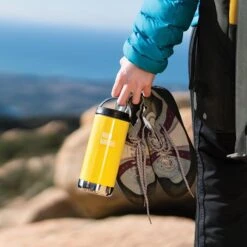 Klean Kanteen Insulated TK Wide With Café Cap 355ml - Brushed Steel -Outweli Camping Shop K12TKWPCC BC hand rocks lifestyle e1537579 685c 41b5 ab6e 47182ddd9812